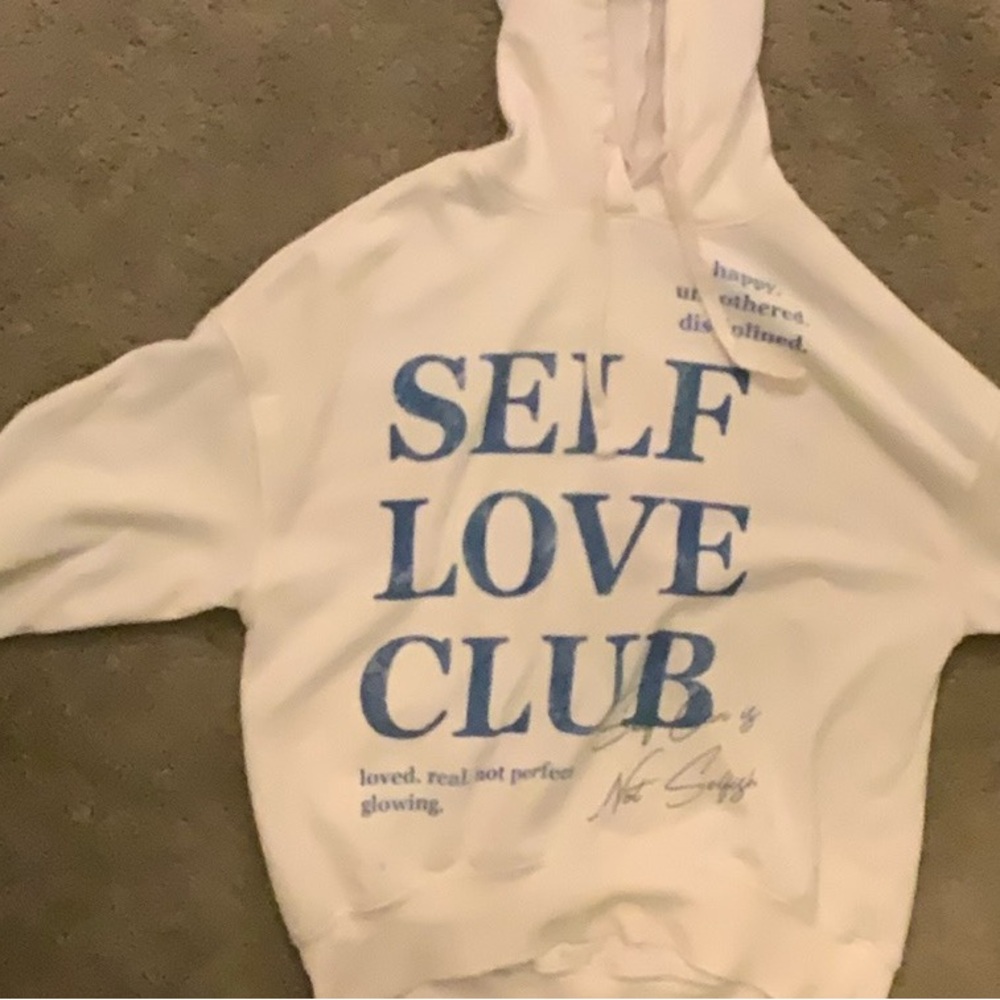 Self-love club sweatshirt.